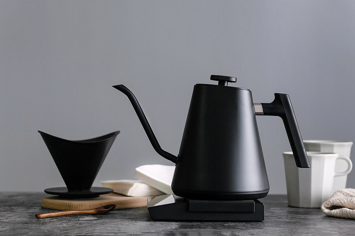 Stylish black kettle used to precision pour a pourover filter coffee.